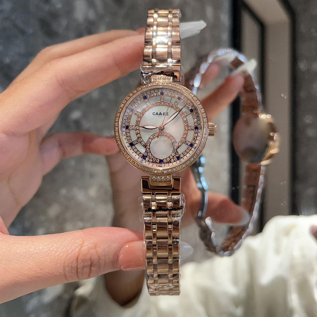 Women' diamond inlaid ocean wedding luxury watches sapphire mirror quartz movement steel band designer womenwatch