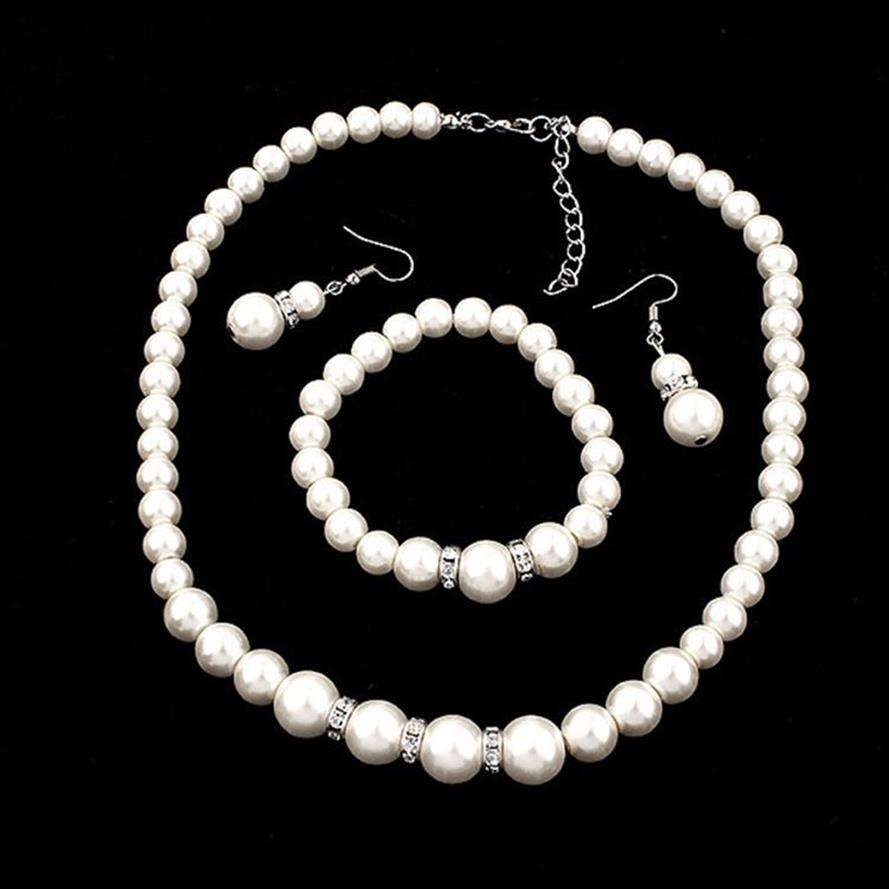 Promotion bijoux de mariée de collier de perles d'imitation créative Bracelet boucles d'oreilles 3 pièces costume de mariage bijoux Set180M