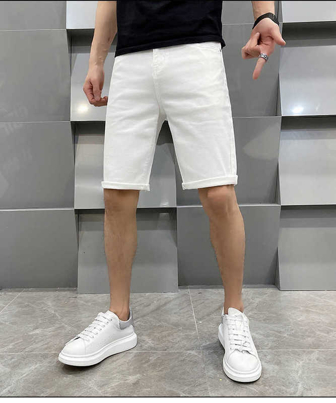 Herr jeans designer sommar tunt kvarter denim mäns high-end mid byxor smal passform varumärke ungdom svart och vit 987b
