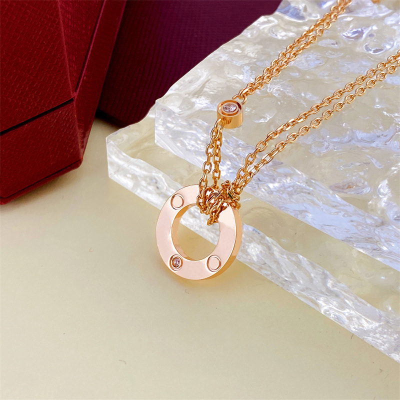 Ne jamais terminer la marque de luxe de luxe de luxe Colliers Pendants Colliers en acier inoxydable Double ring avec diamant Pendant Collier Perles de chaîne Bijoux Accessoires Cadeaux