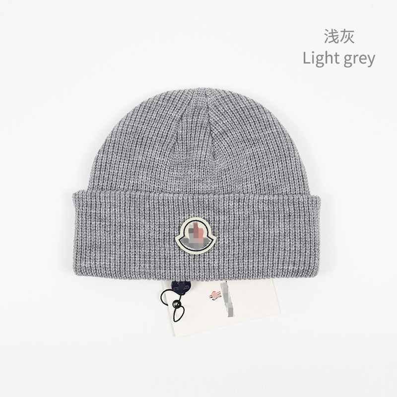 Spot new hat wholesale knitted hat men's tooling wind head cold hat ladies thermal insulation thickened wool hat e-commerce for