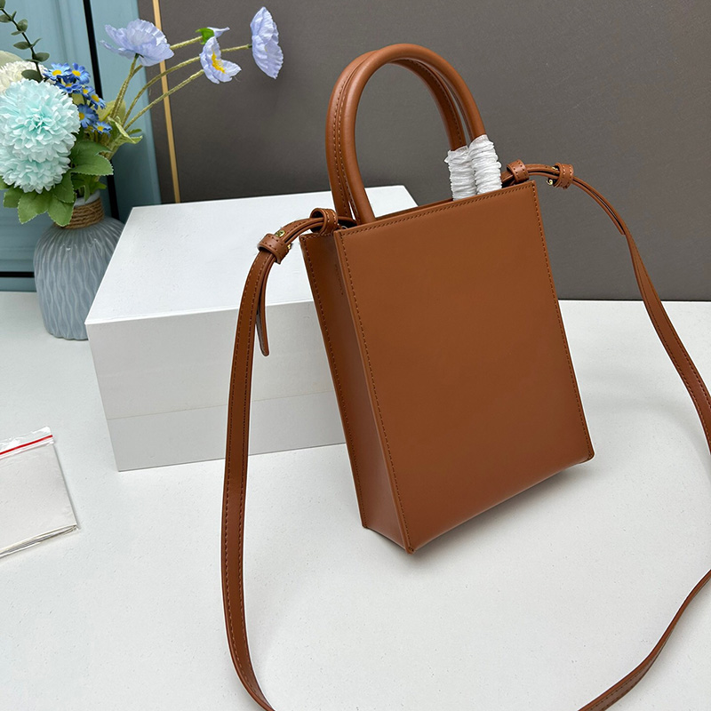 Designer-Tasche für Damen, Standard-A5-Tragetasche, Leder-Umhängetaschen, Designer-Geldbörsen, die Einkaufstasche, Luxus-Handtaschen, Umhängetasche, hochwertige Damen-Handtasche, modische Tragetaschen