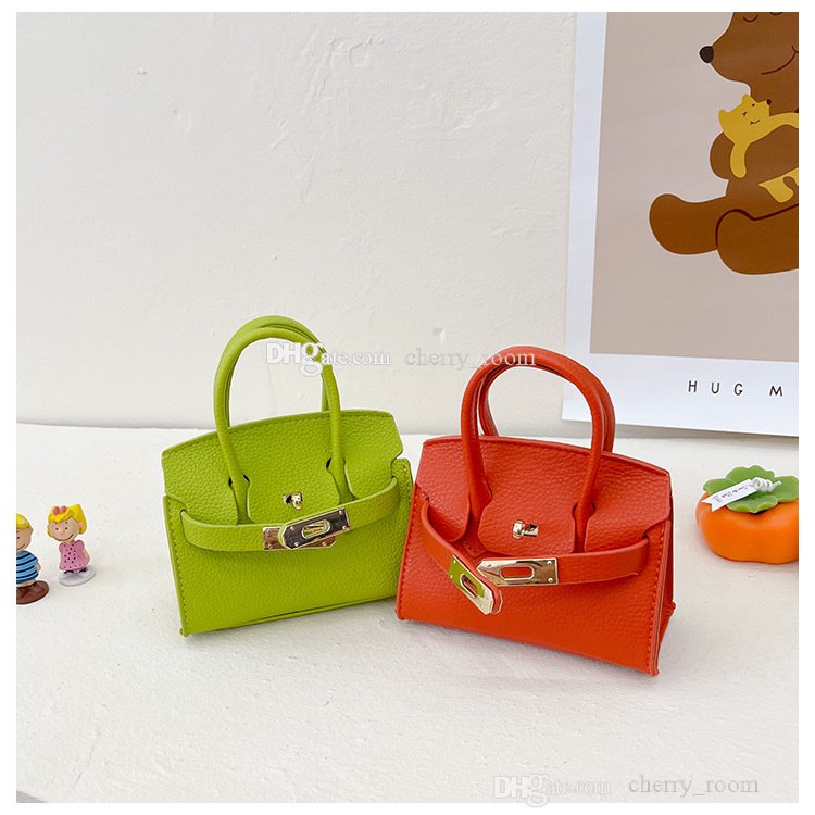 ins barn pu litchee mönster prinsessor handväskor baby flickor solida färger en axel väskor barn en axel mini noll plånböcker F1746