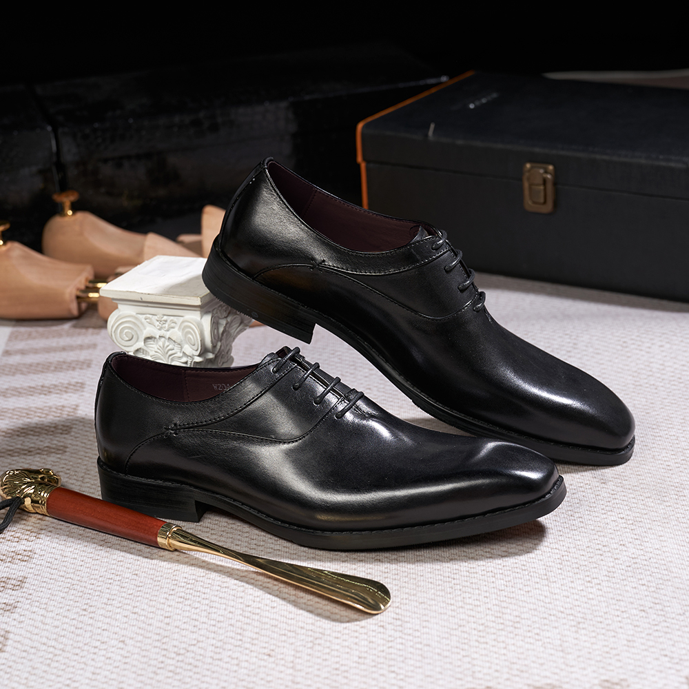 Chaussures habillées masculines classiques véritables à lacets en cuir en cuir un point d'affaires