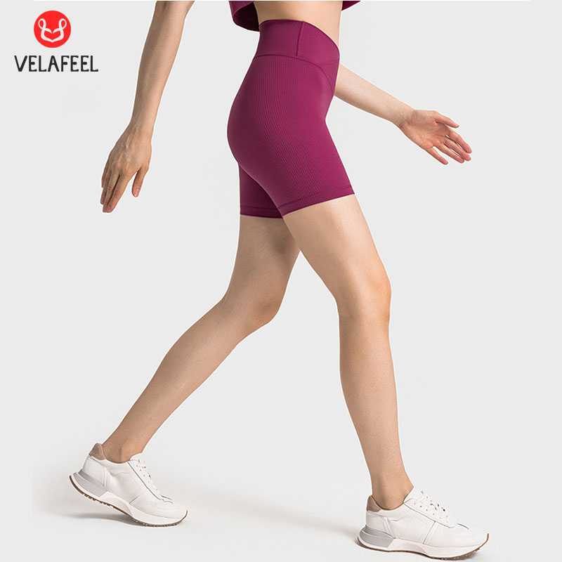 Shorts de yoga côtelés pour femmes Tenues de yoga Leggings de luxe pantalons de sport pour femmes de couleur unie Shorts de fitness taille haute pour le levage des hanches VELAFEEL