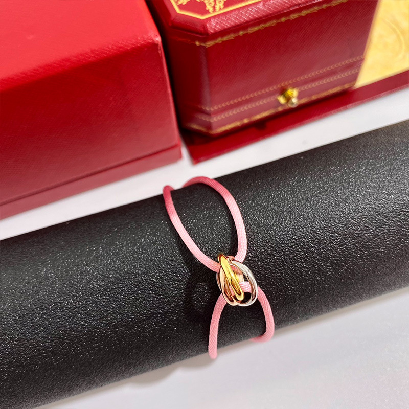 Nouveau bracelet de créateur Bracelet en acier inoxydable chaud Trois anneaux couleurs Boucle en métal Ruban Chaîne à lacets Multicolore Taille réglable Bracelet pour femme Homme Unisexe
