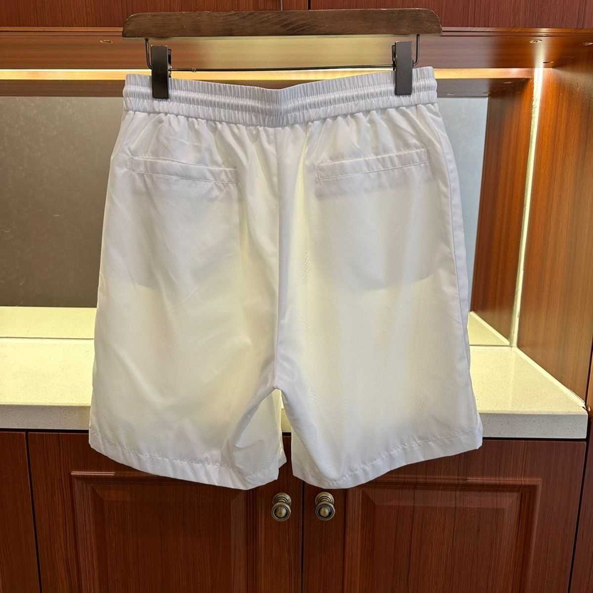 Summer men's nylon elastic sent to loose shorts, nylon touch soft and comfortable, loose version of leisure fashion.