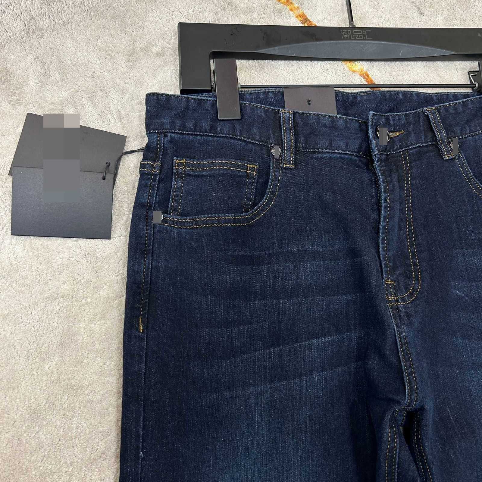 Designer de jeans pour hommes 2023 printemps nouveau pantalon décontracté en denim taille moyenne élastique PMQQ