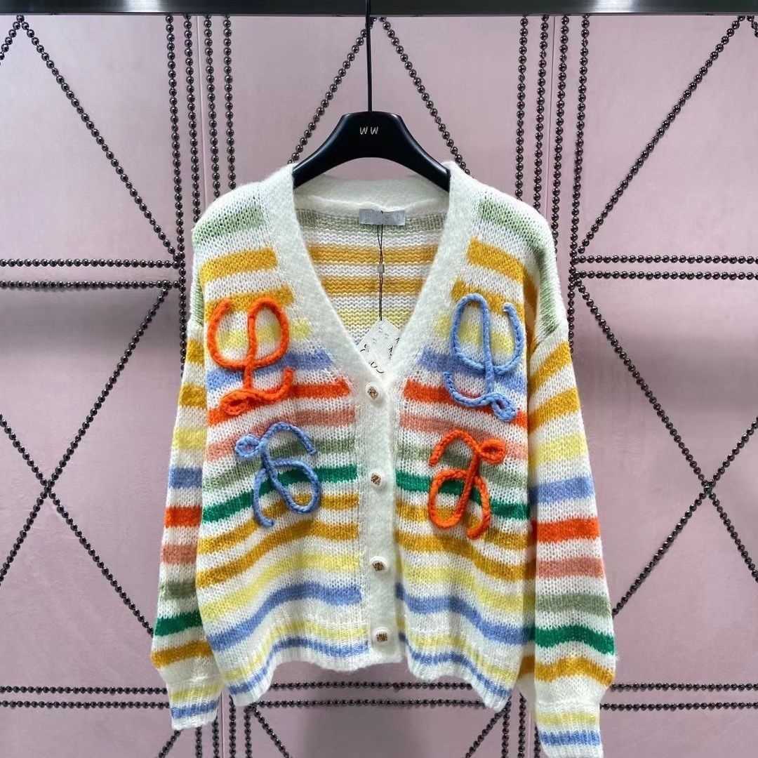 Spring and autumn women`s rainbow stripes large V-neck cardigan sweater knitted coat, knitted fabric soft and comfortable can not afford to ball, casual fashion.
