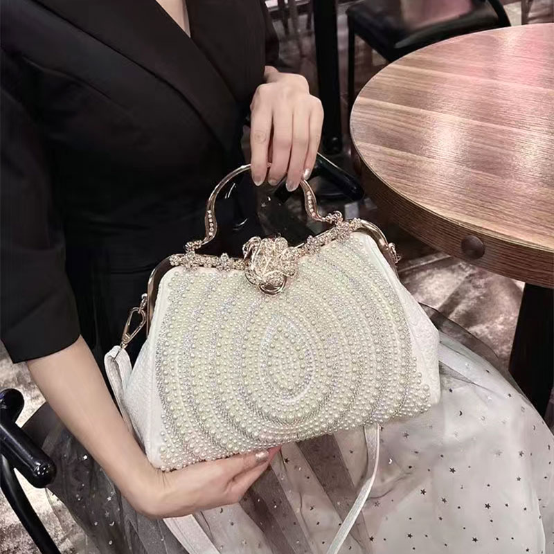 2023 nouvelles dames de mode incrustées de diamants sens avancé lumière luxe perle sac qualité décontracté bandoulière unique épaule sac à main pour les femmes