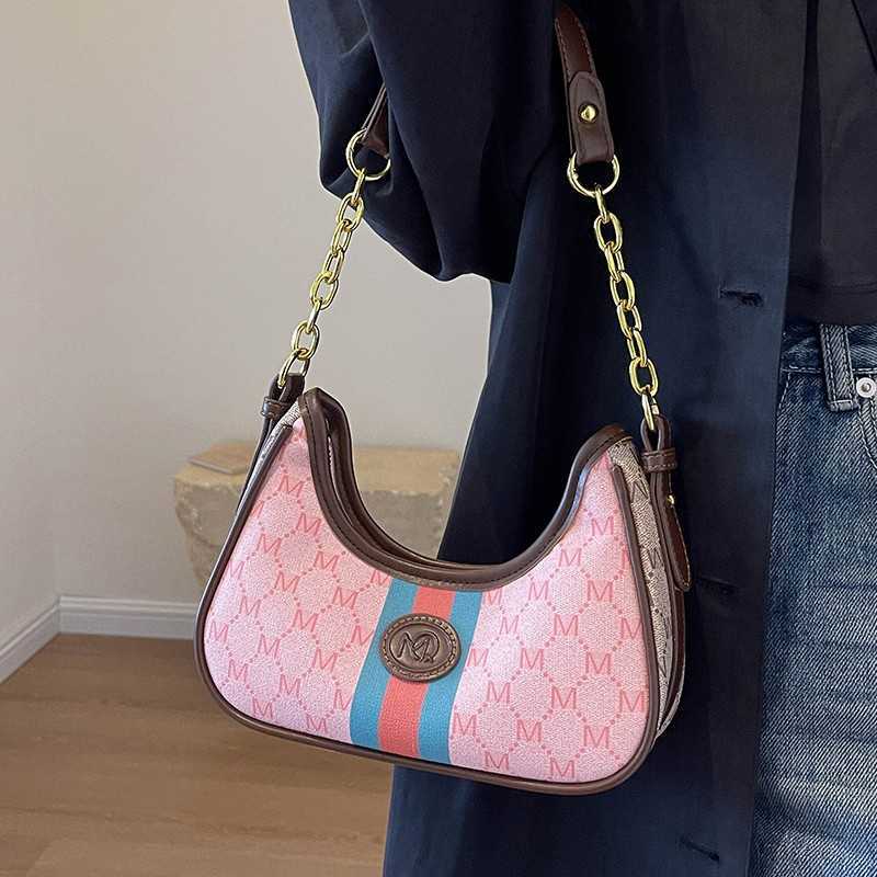 2023 Nova fábrica de vendas diretas de alta qualidade Este ano popular bolsa feminina rosa nas axilas high-end dumpling corrente pendulares saco crossbody