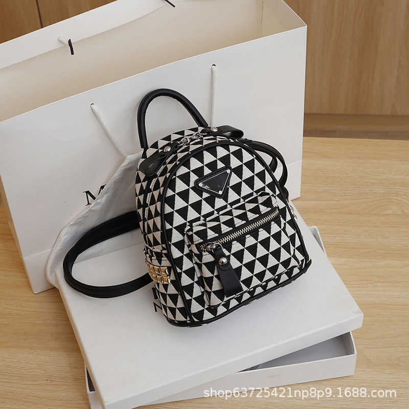 2023 Factory direct sales high quality New Mini Canvas Art Fresh Girl Backpack Versatile Crossbody Fashion Small Bag