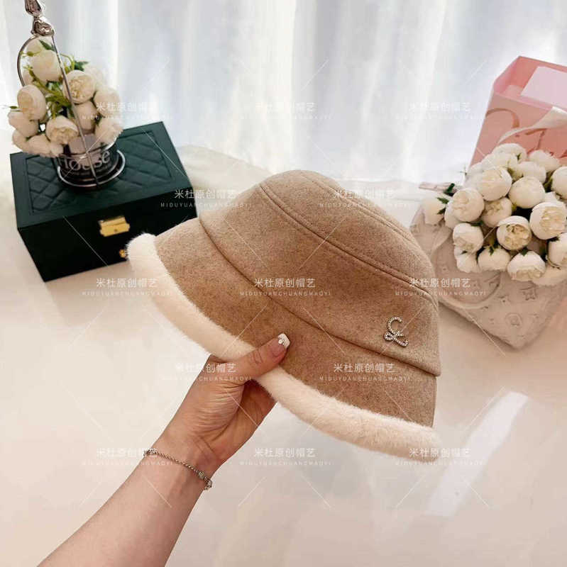 Sombreros de ala ancha Sombreros de pescador Diseñador Otoño Invierno Nuevo Tejido de lana sólida Sombrero de pescador minimalista y versátil Lujo ligero Sensación de alto grado Sombrero de cubo Lindo