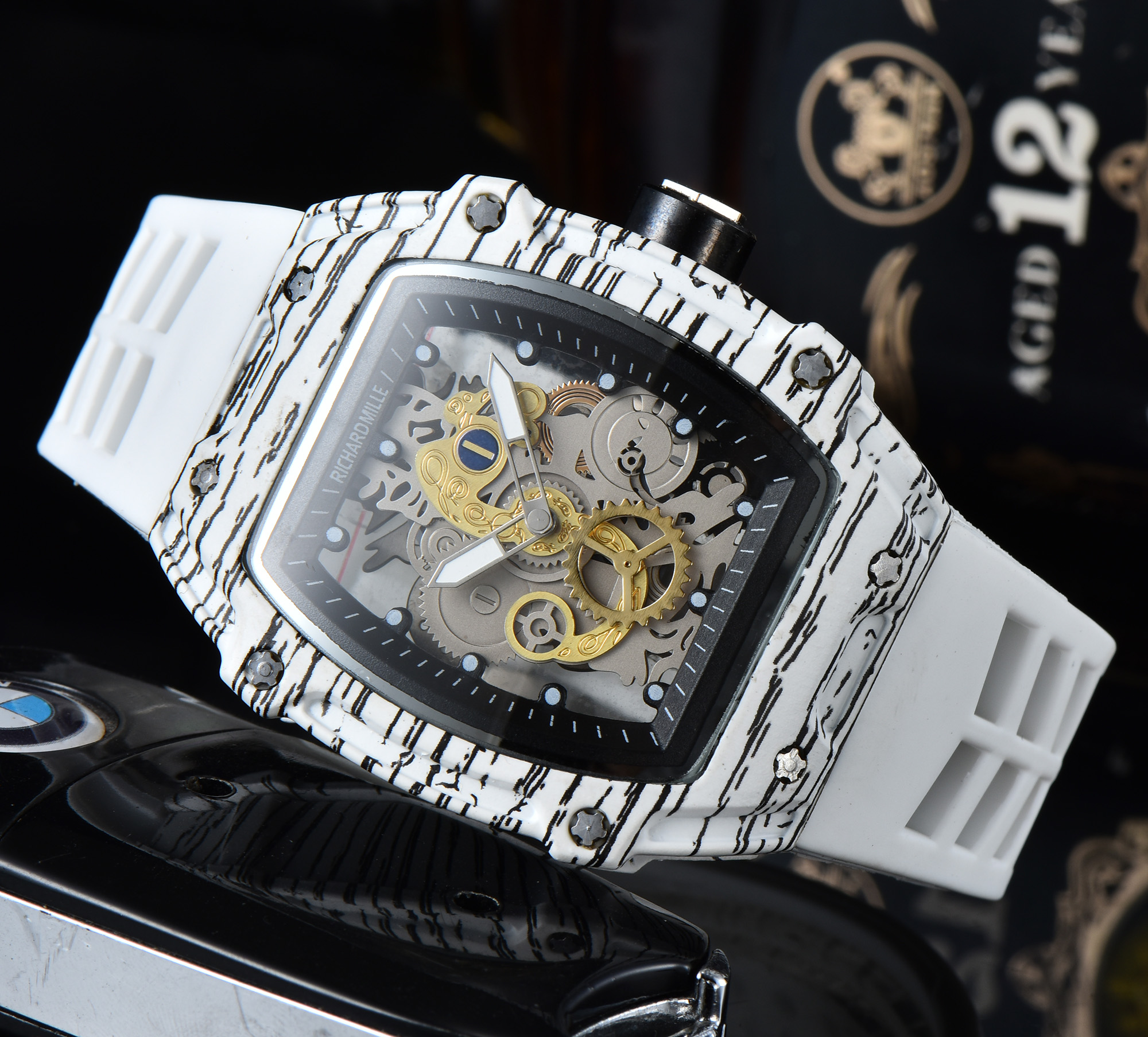 Expensive designer of high quality two-pin half-rotating second wheel imitation carbon fiber hollow transparent fashion watch manufacturers agent