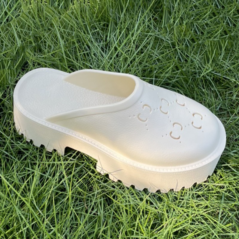 2024 Sandalias de diseñador de lujo para mujer, zapatillas de plataforma hueca, zapatos de playa Sunshine, zapatos Baotou de moda, zapatos con agujeros sexys, zapatillas masculinas para interiores y exteriores