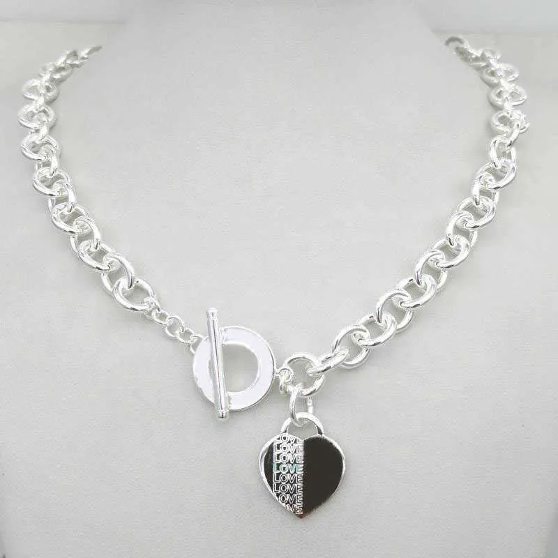 E057 Ожерелья с подвесками Дизайнерское ожерелье Женская серебряная цепочка в стиле Tf S925 Стерлинговый ключ Сердце Любовь Яйцо Бренд Шарм Ne