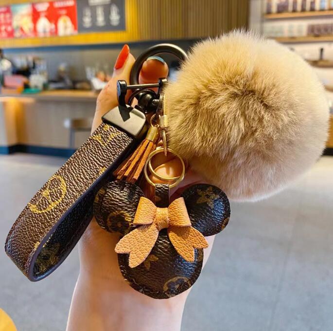 Nouveau style en cuir porte-clés concepteur boucle de porte-clés lapin Hairball dessin animé en peluche mignon voiture porte-clés hommes et femmes sac pendentif accessoires