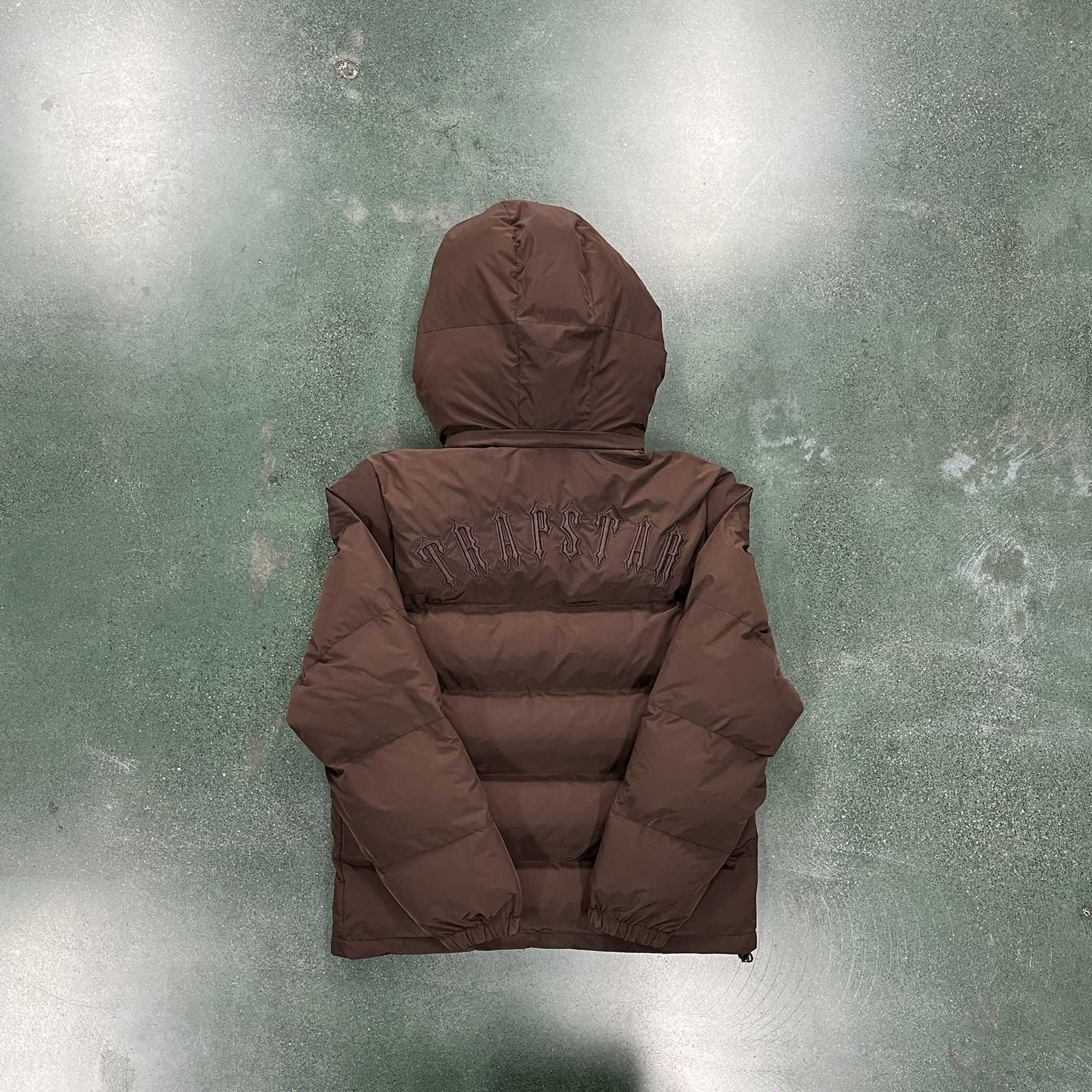 2023 Nouveaux hommes et femmes Doudounes Trapstarss Explosions Tide Marque Marron Petite étiquette Automne / Hiver Coton Top Mode Couple Manteau à capuche