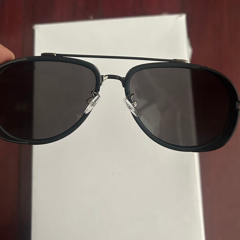 Nuevo Marco de metal negro mate Gafas de sol de ojo de gato Lente de 60 mm Lente redonda clásica Hombres Mujeres Alta calidad Conducción vintage UV400 Gafas de sol Gafas con caja