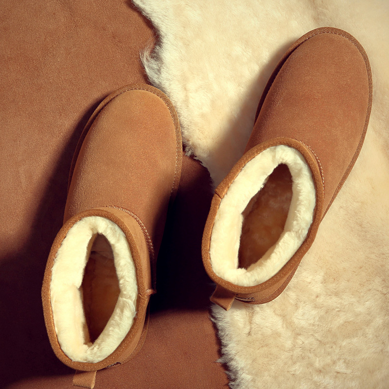 Sapatos de pão masculinos à prova d'água antiderrapantes com pele espessa integrada com sapatos de algodão para mulheres inverno 5854 botas de neve de couro para homens