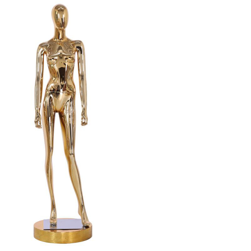 Nya gyllene mannequin smala kvinnor modellerar hela kroppen för display