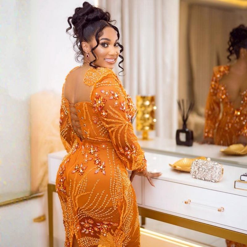 Orange African Aso ebi Prom Dresses Sexy Sexy See من خلال فستان سهرة Tulle ذات الأكمام الطويلة الطويلة.