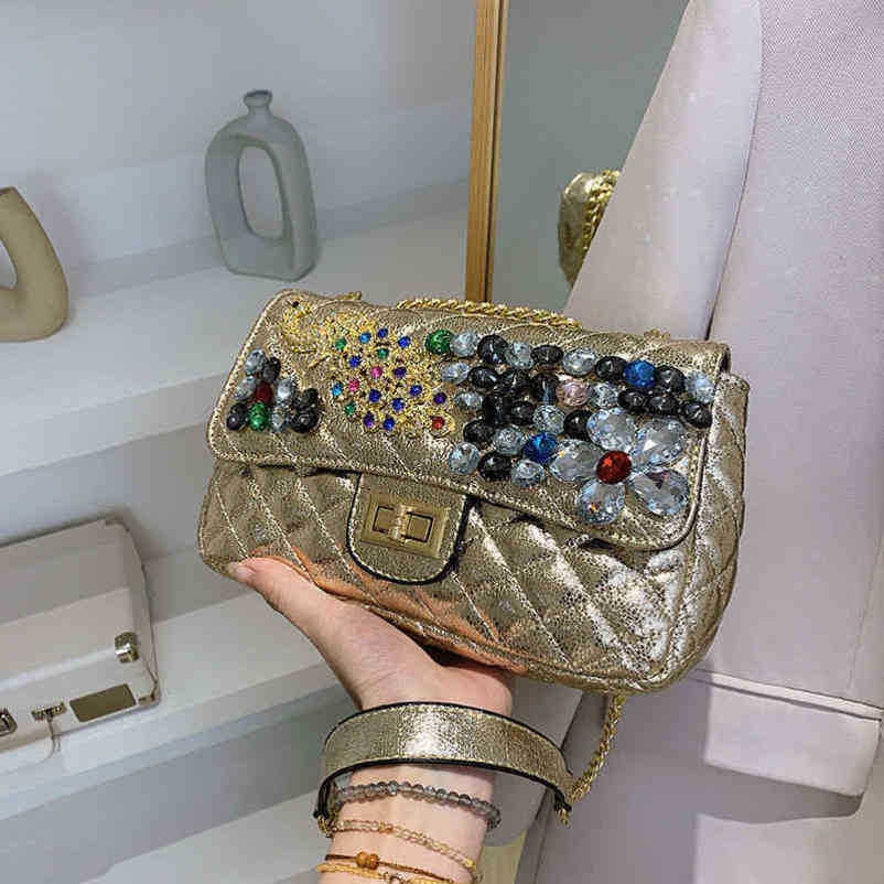 Borsa a tracolla con tracolla a tracolla da donna del nuovo designer 2024 con strass, piccola fragranza, borsa a tracolla intarsiata con diamanti in stile catena Lingge