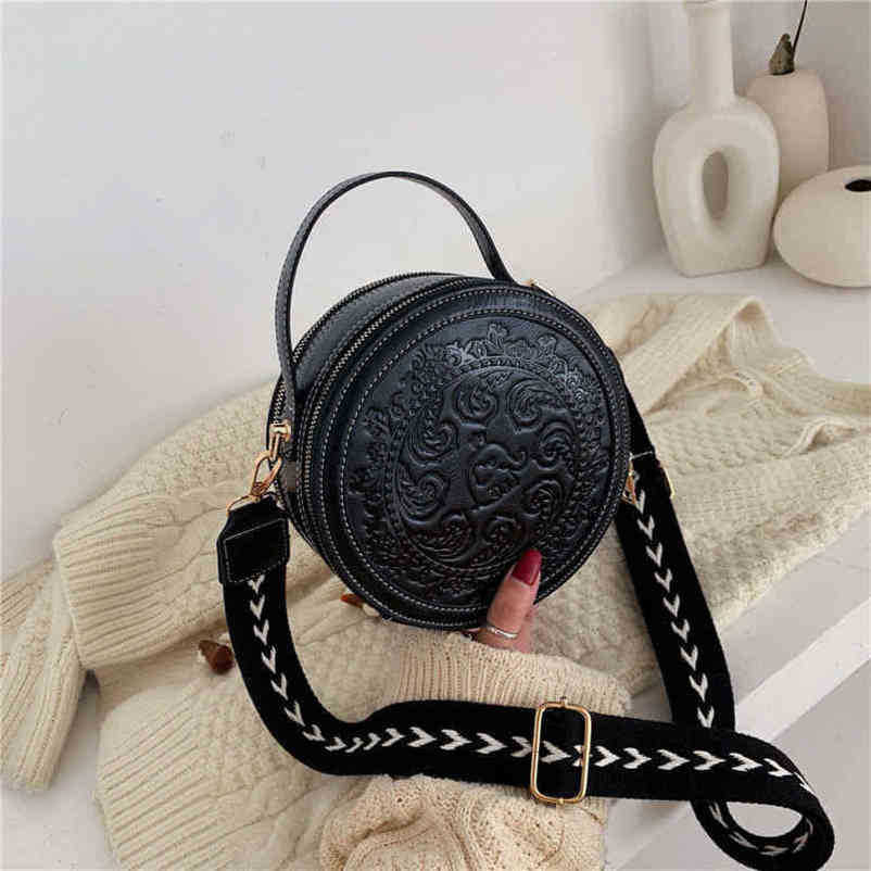 2024 Nouveau designer pour femmes crossbody bodin reverro hong style tempérament incliné petit sac rond