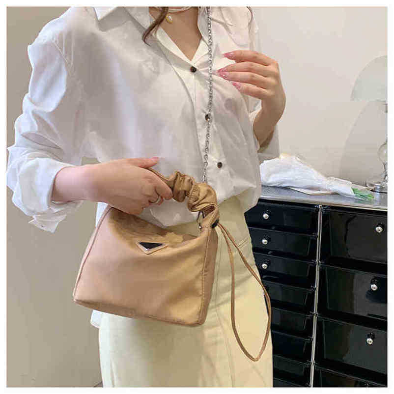 2024 Nouveau concepteur pour femmes crossbody épaule ressentant le sac sous les bras et la version pop portable messager