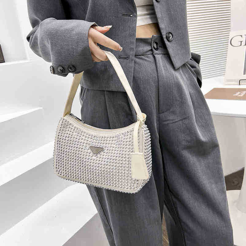 2024 Neue Luxus-Handtasche von hoher Qualität unter dem Arm mit Diamant-Strass-Rot-Stil-Schulranzen-Sattel CVJQ