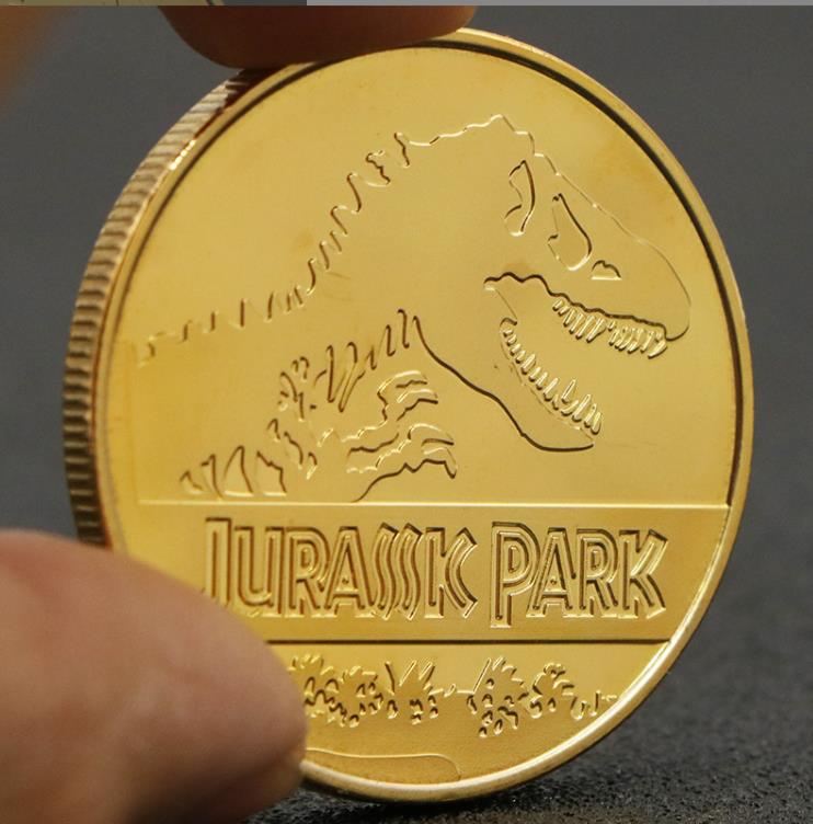 Arti e mestieri Moneta commemorativa placcata in oro dei dinosauri nel Jurassic Park degli Stati Uniti
