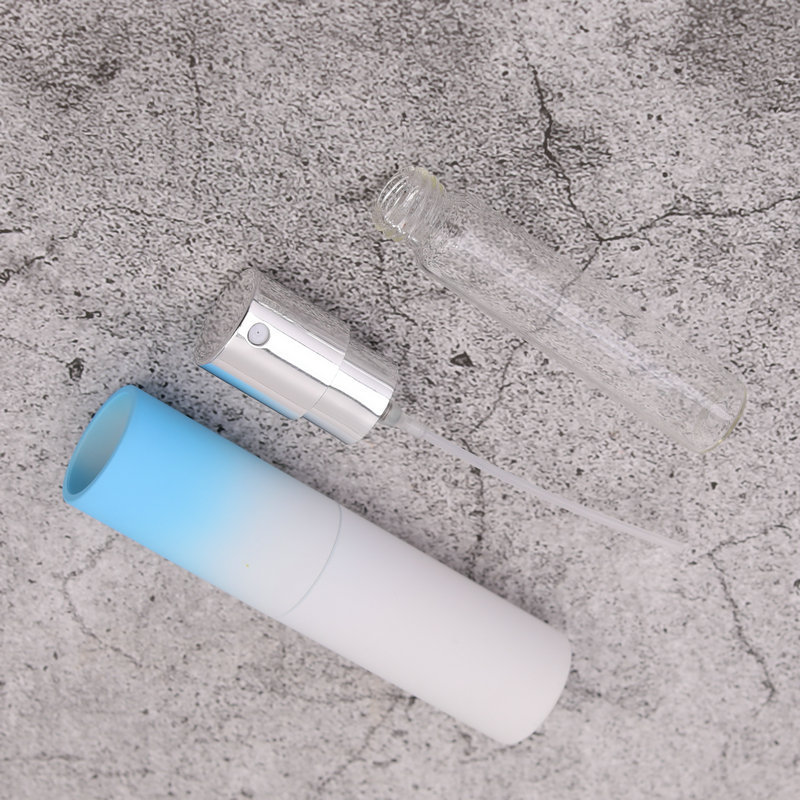 Bottiglia di profumo portatile da viaggio con flacone spray rotante all'ingrosso Contenitore bottiglie cosmetiche in vetro da 8 ml