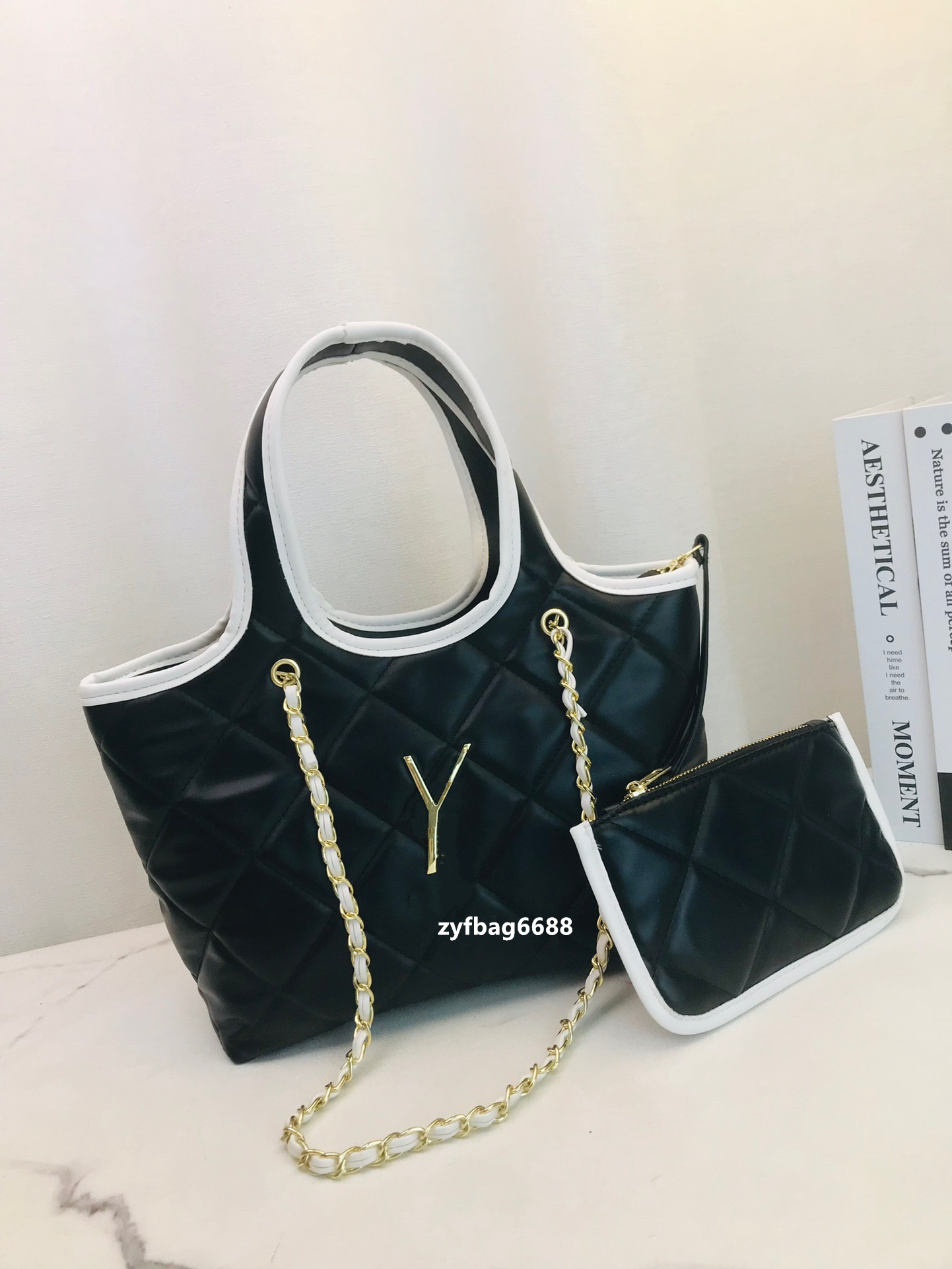 23 Ny lyxdesigner Bag axelväska Kvinnor mode mode parning hinkväska stjärnväska nytt material svartvitt läder engagemang gåva