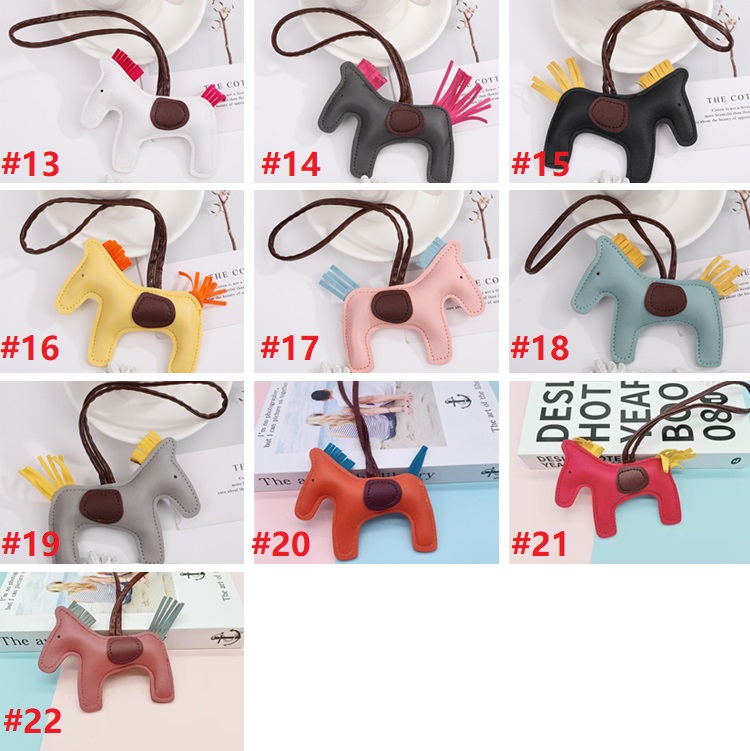 es llaveros de moda lindo bolso de mujer colgante de gama alta hecho a mano PU bolso llaveros borla rodeo caballo bolso encanto bolso accesorios 2332