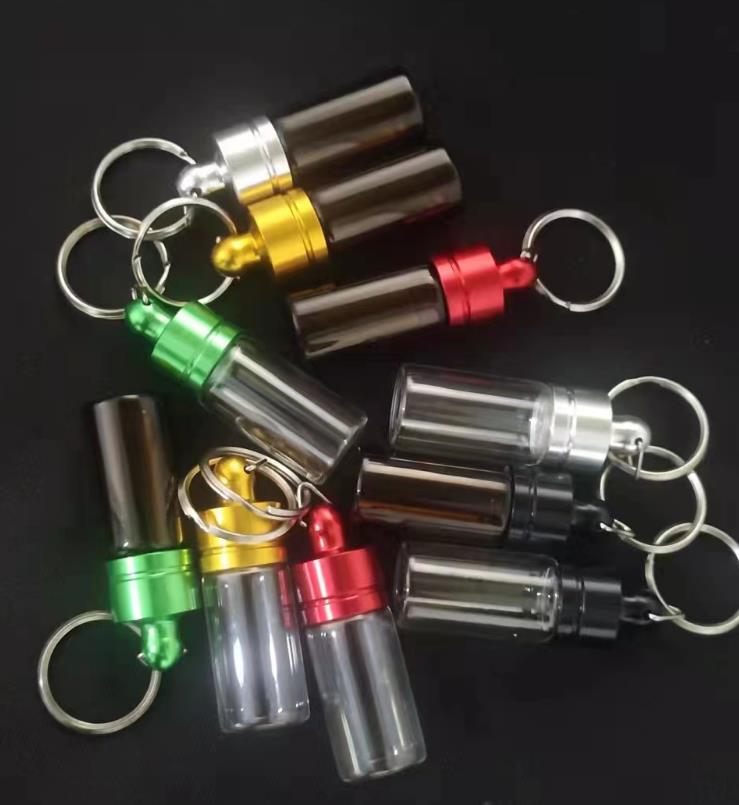 Bottiglia di tabacco da fiuto in vetro Snorter da fumo con portachiavi a cucchiaio Sniffer Snuffer Scatola di immagazzinaggio erbe secche Cera olio di tabacco Rigs Dabber Cucchiaio Accessori