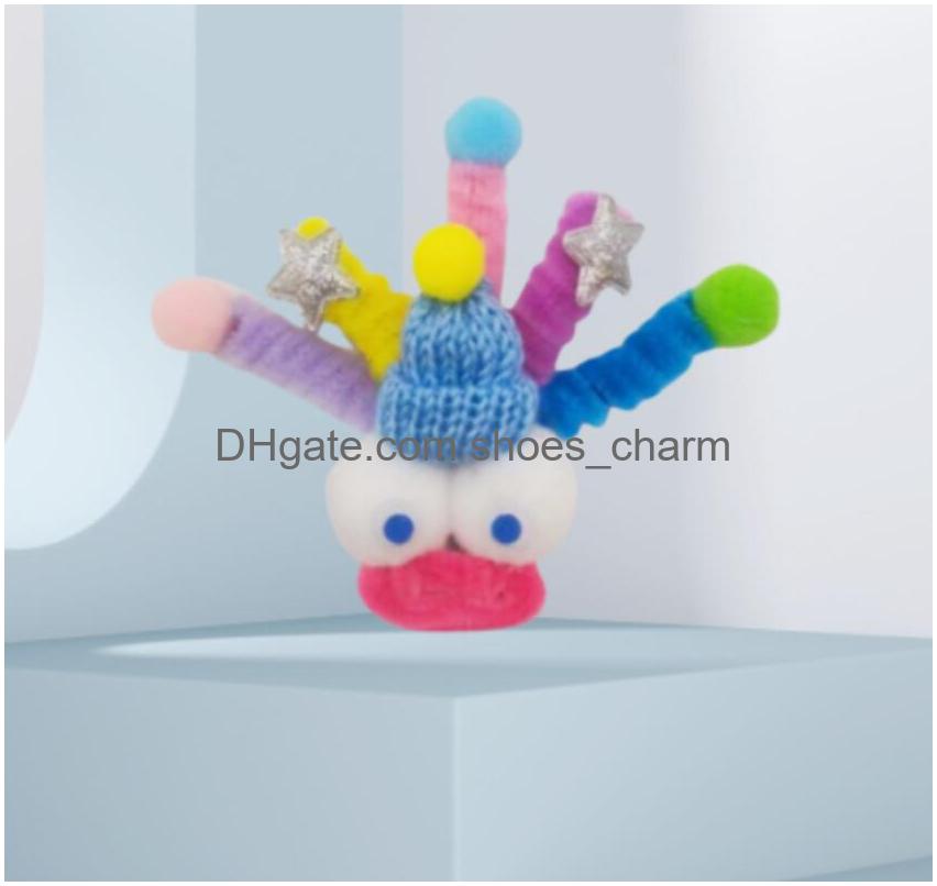 Cartone animato Divertente Cappello di lana Mostro dagli occhi grandi Twist Stick Jibtz Charms Fibbia Clog Bottoni Pins Polsino Bracciale Decorazione Bambini Adolescenti Regali feste