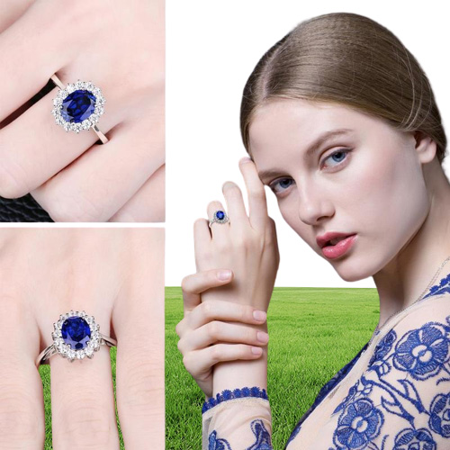 Jewelryrapalace Princessは、女性のためのブルーサファイア婚約リングを作成しましたケイトミドルトンクラウン925スターリングシルバーリング2202105074398