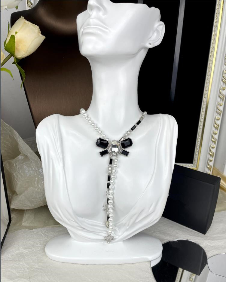 Collane con ciondolo Gioielli di lusso di alta qualità, gioielli alla moda, gioielli europei e americani, nuove collane di perle con fiocco