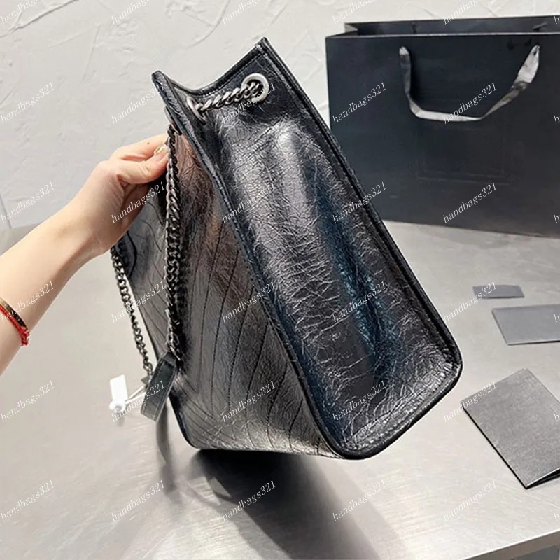 Designer Niki bolsa de compras bolsa feminina Bola preta de grande capacidade Pacote de ombro Bolsas de ombro de ombro Bolsas de moda de couro de ímã Genuíno