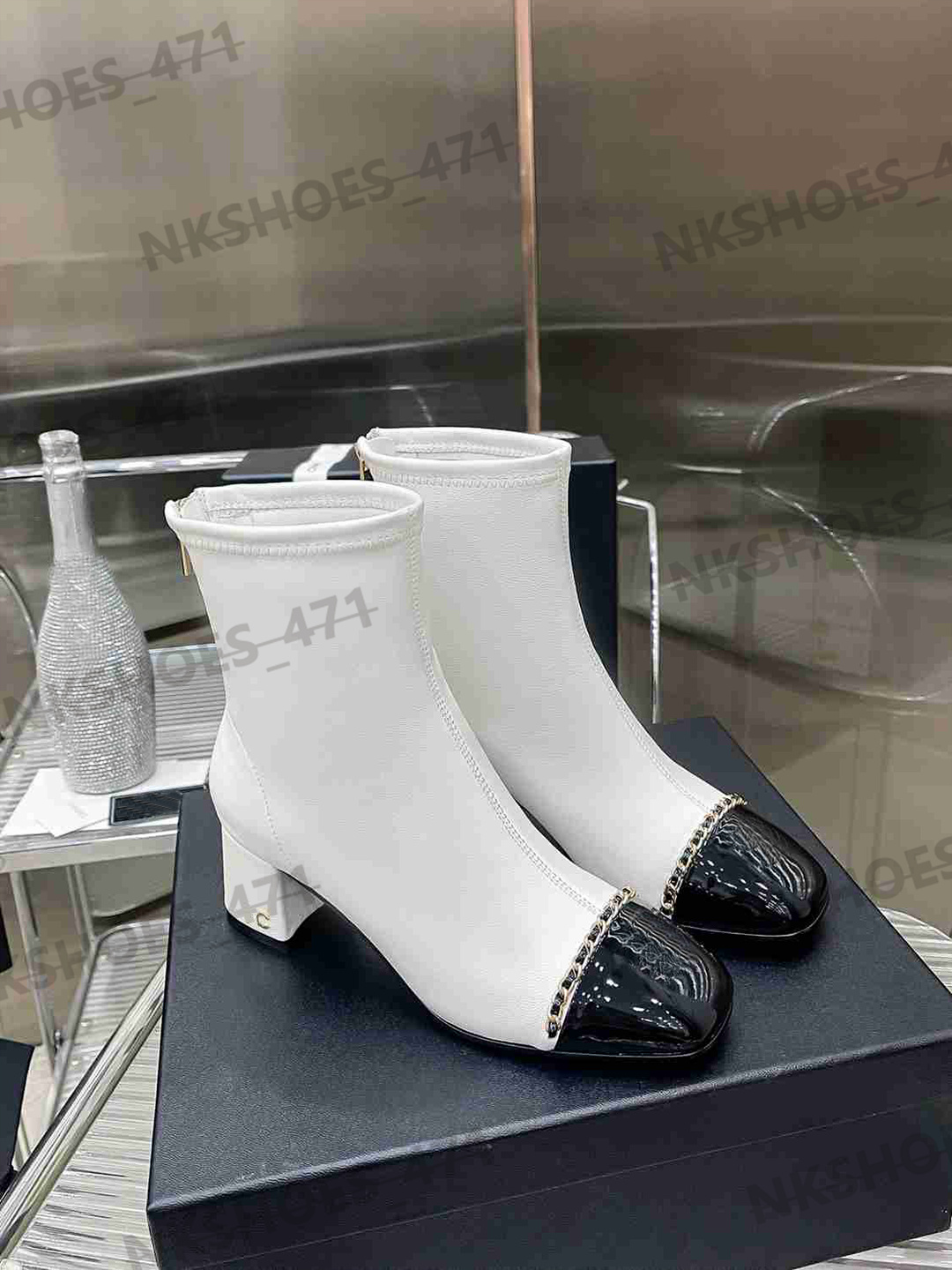 Designerlaarzen Luxe merk Martin-laarzen Zwart lederen Chelsea-laarzen Hoge kwaliteit mode Dames Zwart Wit Splicing Korte naaktlaarzen