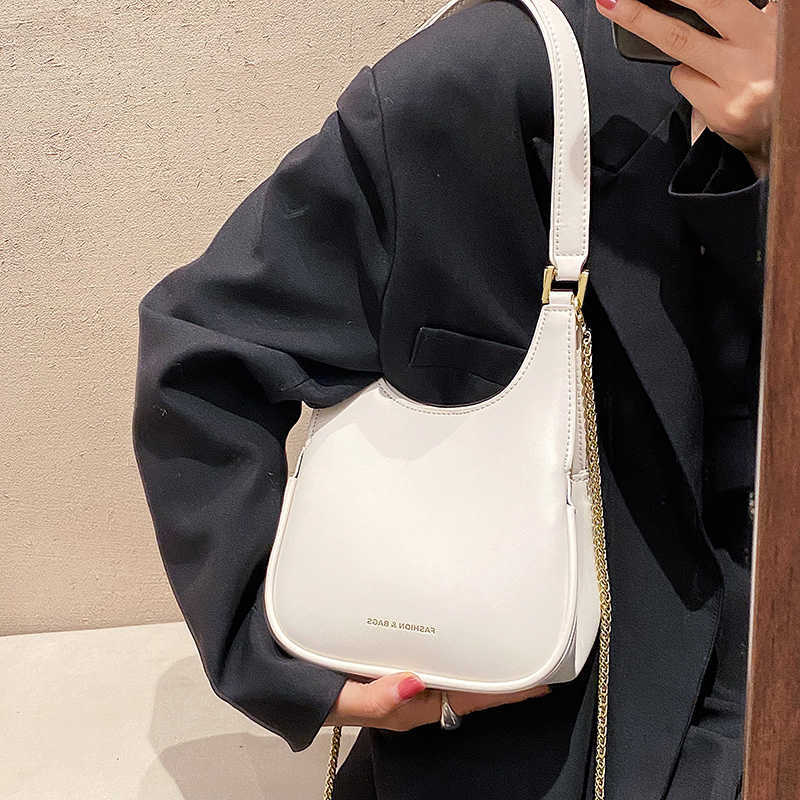Takken Nieuwe schoudertassen voor vrouwen hoogwaardige PU -bucket Bag Leuke portemonnees en handtasontwerper Crossbody tas ketting satchel okseltas