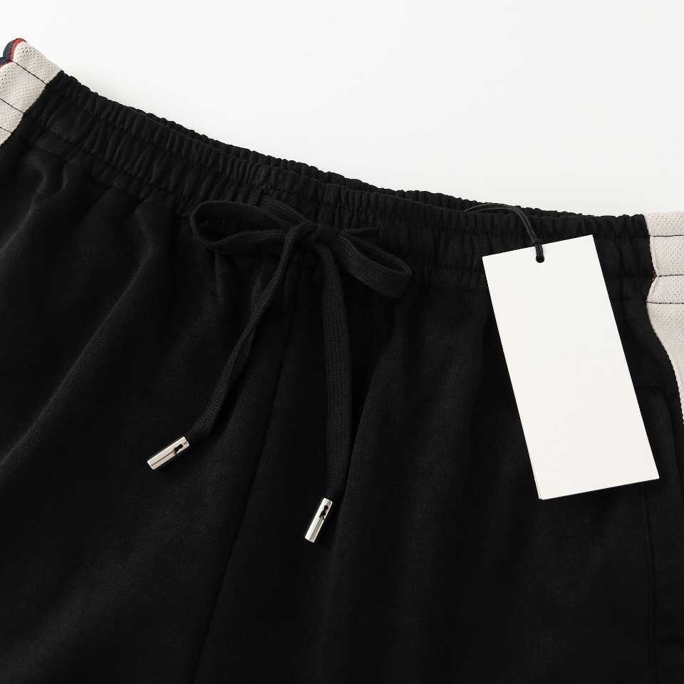 2023 NYA DESIGNER WOMENS T-skjorta avancerad skjorta Rätt version av utskrift elastiska bandbyxor avslappnad mångsidig lös shorts