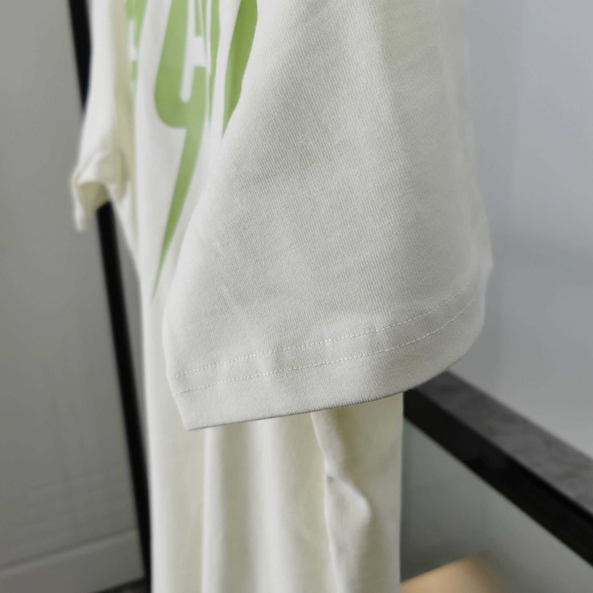 Lüks Tasarımcının Yeni Erkek ve Kadınlar Kısa Kollu Spor Giyim Seti Gömlek Kendi Kendine Tasarlanmış Yaz Yeşil Şimşek Bıçağı Baskı Çift Kısa Kollu T-Shirt Gevşek Fit