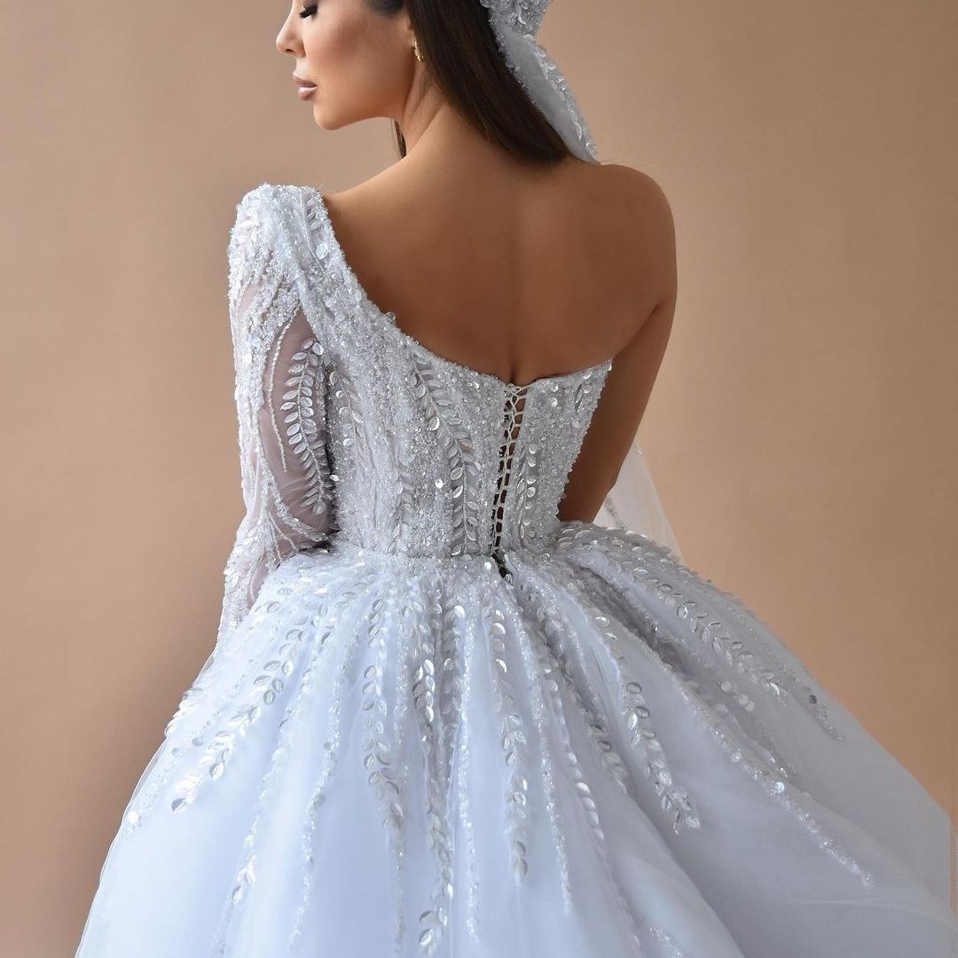 Abiti da sposa eleganti a sirena Una manica lunga Bateau Appliques Paillettes Pizzo 3D Staccabile Strascico in pizzo Perline Abiti da sposa lunghi fino al pavimento Abiti da sposa su misura