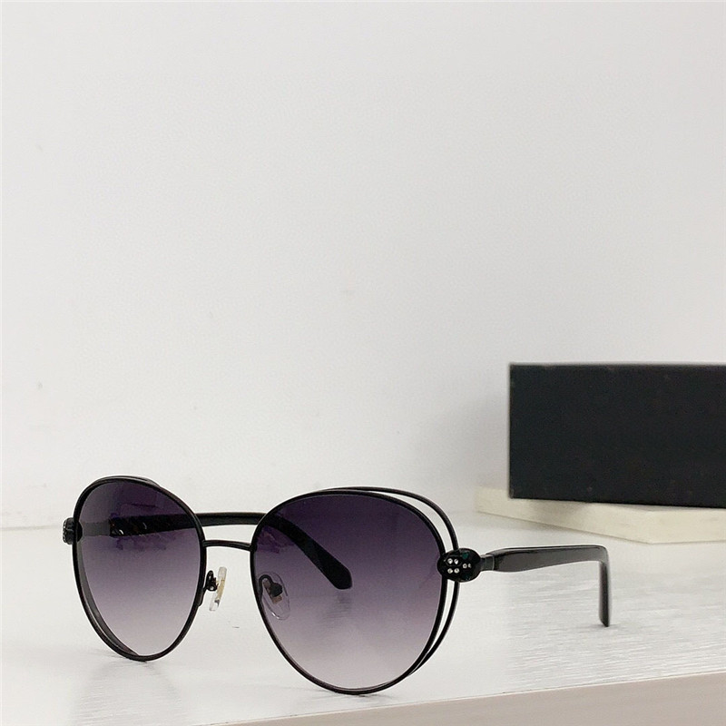 Nouveau design de mode lunettes de soleil en forme de papillon 6087 monture en métal style simple et élégant lunettes de protection uv400 extérieures haut de gamme