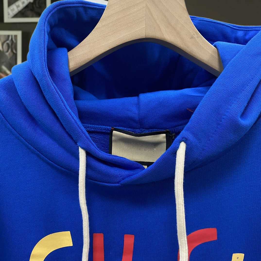 Juego de ropa deportiva de manga corta para hombres y mujeres del diseñador de lujo Camiseta Primavera 2023 Nuevo letra con capucha impresa etiqueta suelta coreana