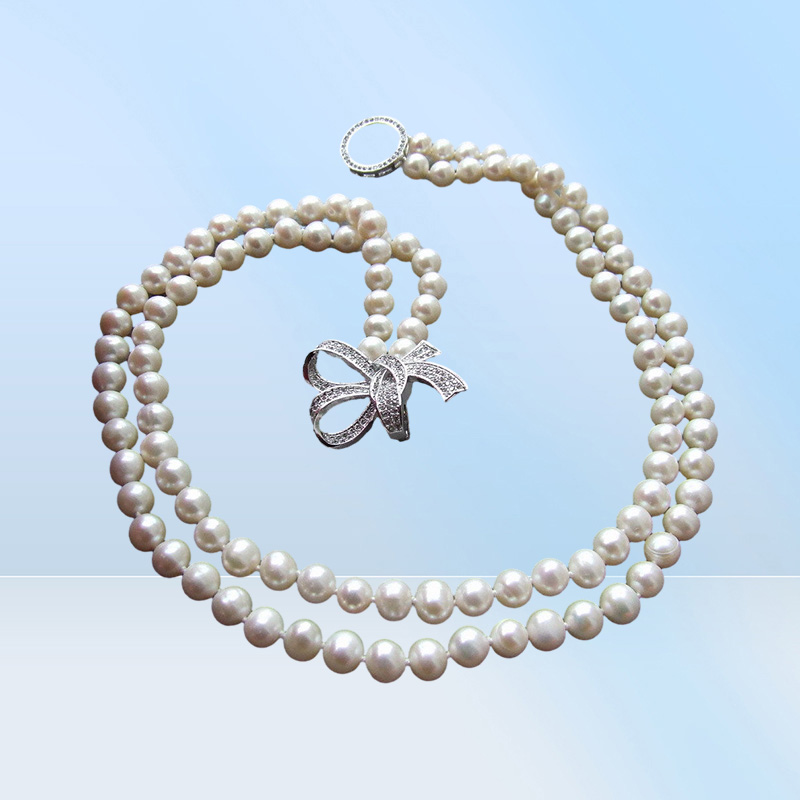 Handgjorda 78mm White Freshwater Cultured Pearl Micro Inlay Zircon Accessories Bowknot Flower Sweater Necklace Long 5053CM3169796