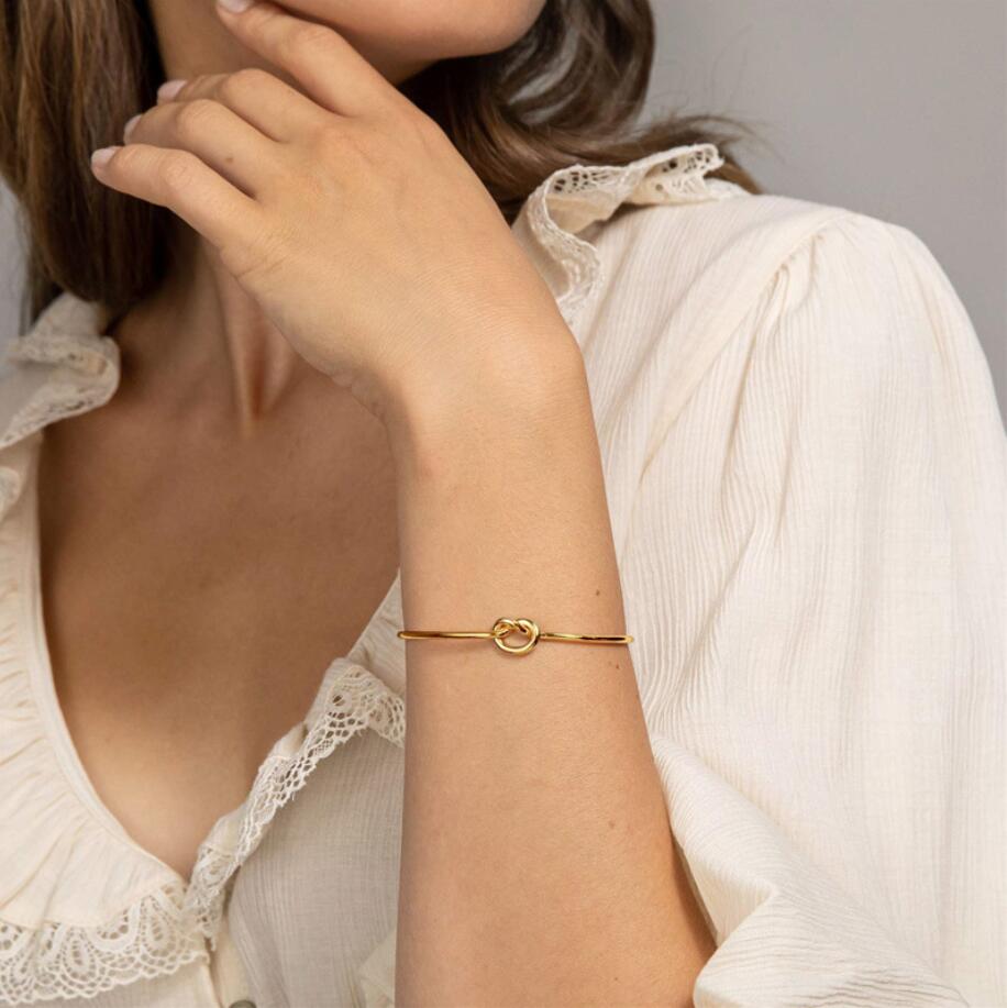 Moda simples temperamento nó pulseira para mulheres aço inoxidável amarrado pulseiras