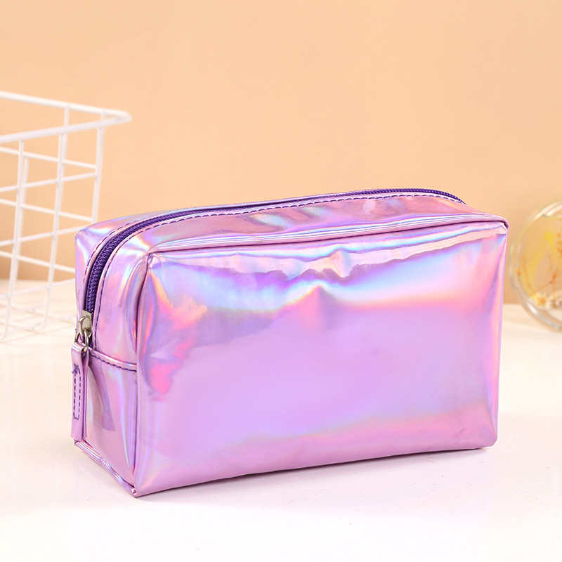 Bolsas de mão para armazenamento de cosméticos em PVC Laser INS à prova d'água para mulheres Bolsa portátil com zíper de metal para viagens para casa Cuidados com a pele Maquiagem Batom Organizador de telefone Bolsas