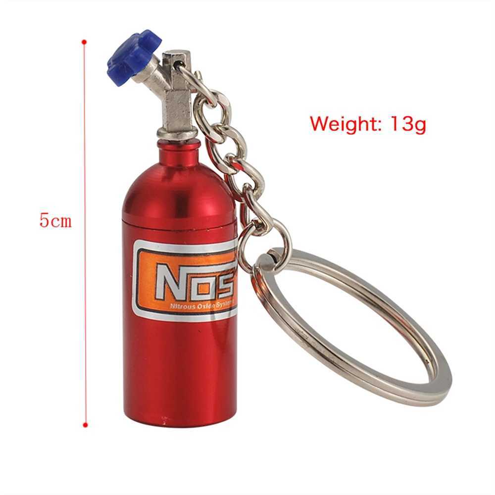 Bilnyckel simulering NOS Nitrous Oxide Bottle Keychain Creative Auto Parts Keyrings Fashion Car Keyholder Accessories Bag Charms Giftl231153